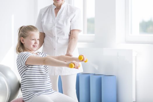 A young girl doing exercises for the physicians